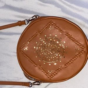 boho circle purse, moda luxe, never used. pockets on back and inside